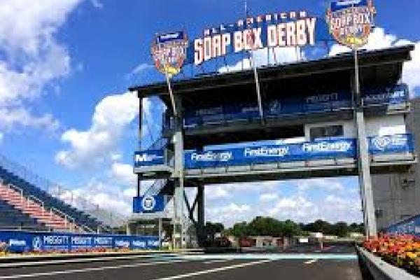 Entrance to the FirstEnergy All-American Soap Box Derby track with signage and grandstands in Akron.