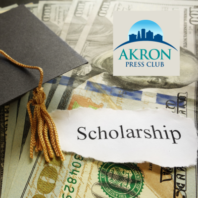 scholarship text on bills with graduation cap